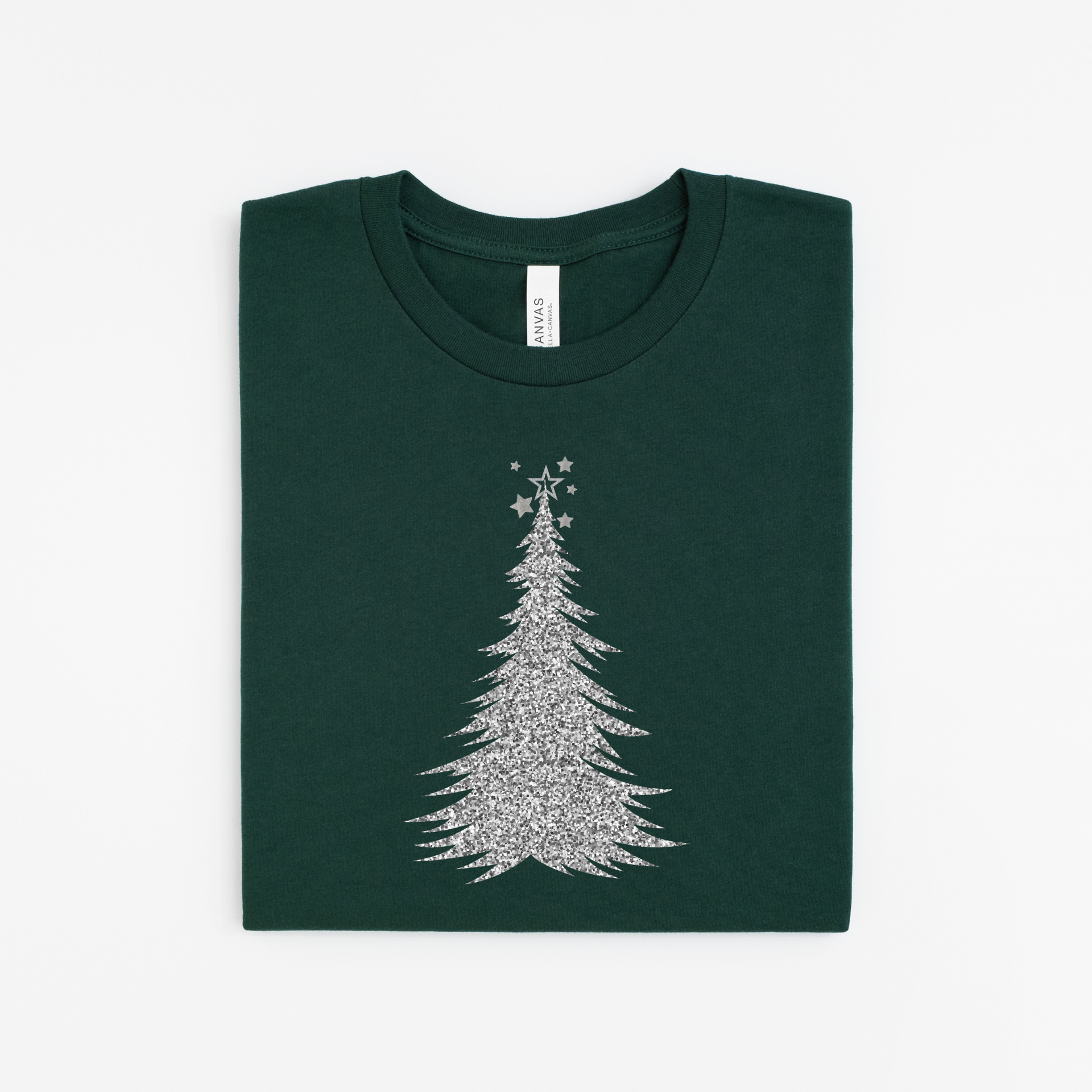 Green t-shirt with a silver Christmas tree design on a white background